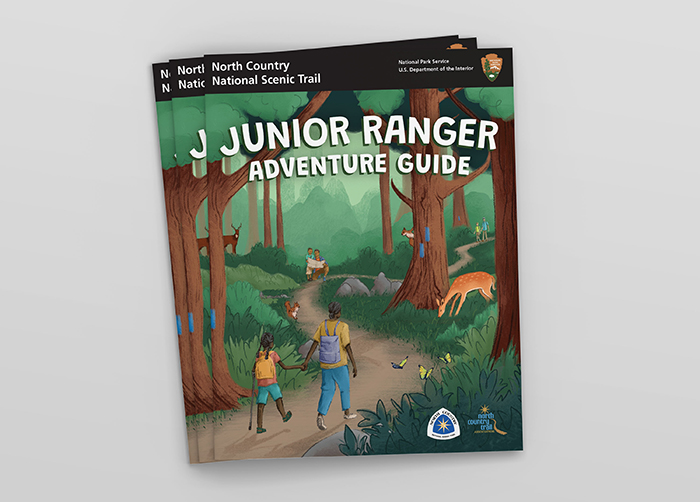 Junior ranger adventure guide with custom illustration of the forest trail.