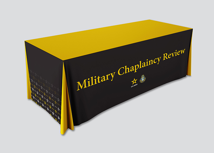 Table covering with bold yellow messages on a black background.